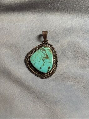 Running Bear Trading Company .980 Sterling Silver Navajo Turquoise Pendant